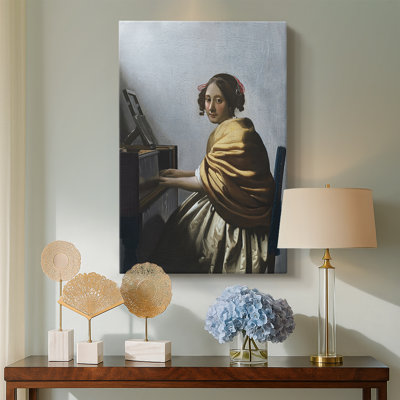 Une jeune femme assise chez les Vierges - Toile tendue avec châssis par Jean Vermeer