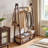 Solid Wood Garment Rack with Lockable Casters and Storage Basket - Walnut Finish