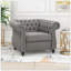 Fauteuil club capitonné