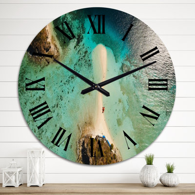 Vue aérienne de l'eau turquoise sur Beahc - horloge murale nautique et côtière