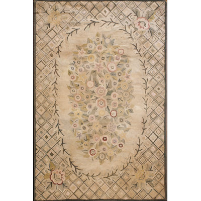Tapis en laine antique ivoire beige crème à motif médaillon antique