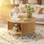 Table basse ronde avec rangement, plateau relevable cannelé, porte d'armoire coulissante, design moderne, naturel-724339466