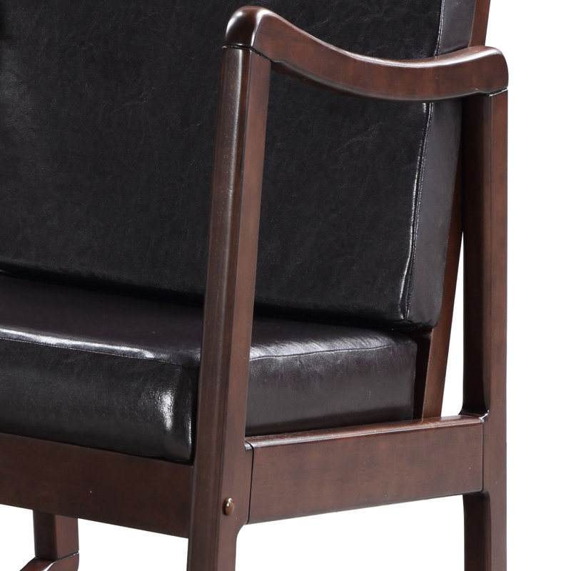 Chaise à bascule brun foncé et rembourrée de mousse pour une expérience de détente moderne avec un rembourrage de finition