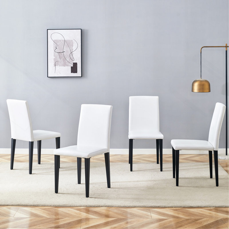 Quatre chaises de salle à manger en polyuréthane blanc, simples et polyvalentes, confortables et accompagnées (ensemble de 4 pièces)