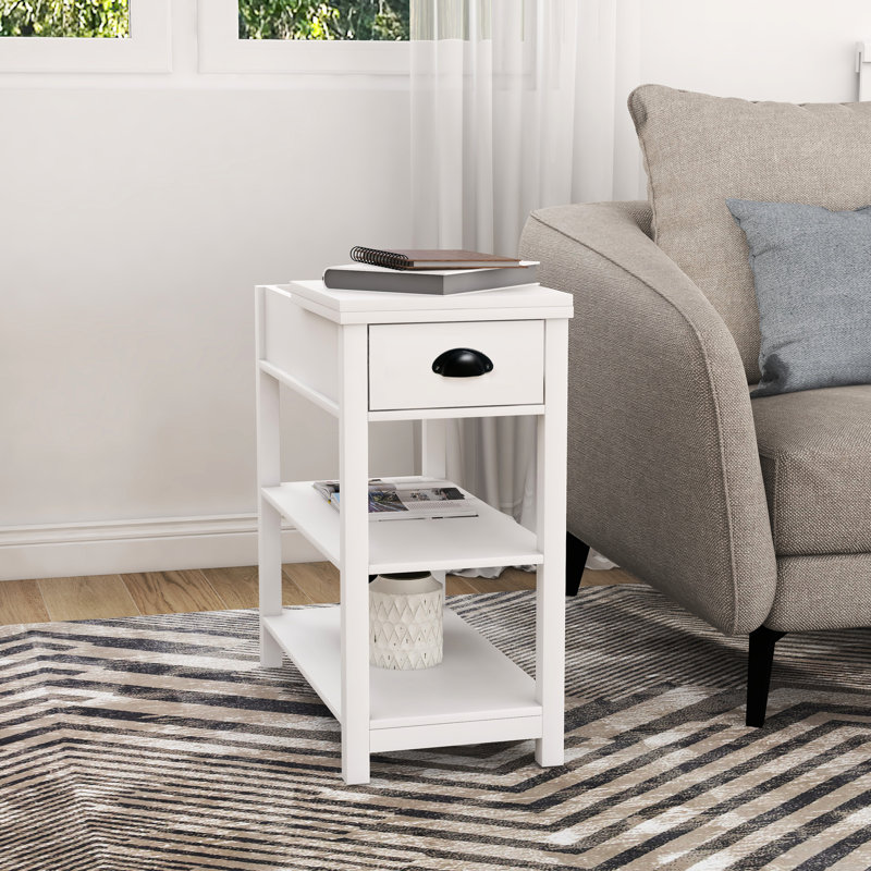 Table d'appoint étroite blanche avec compartiments de rangement, faite pour la décoration de chambre à coucher dans la cloison inférieure et les tiroirs, bureau