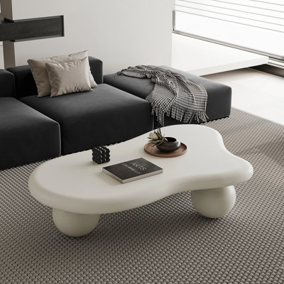 47 Inch Cloud Shaped Coffee Table with 3 Ball Legs for Living Room, Cream White