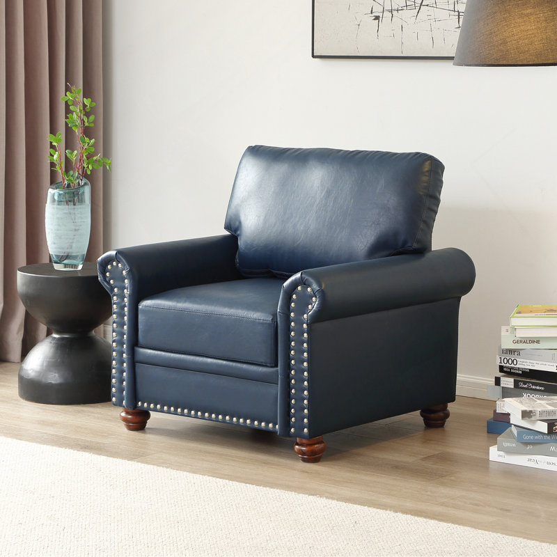 Fauteuil de salon simple avec pieds en bois et similicuir bleu marine
