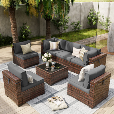 Keyala 7-Piece Rattan Sectional Seating Group with 4-Inch Thick Cushions and Waterproof Cover