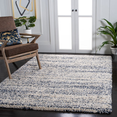 Audriauna Ivory/Navy Area Rug