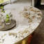 Table basse ovale contemporaine 55 po avec surface en pierre frittée et tiroir caché