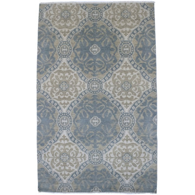 Tapis bleu sarcelle à motif géométrique 6X9