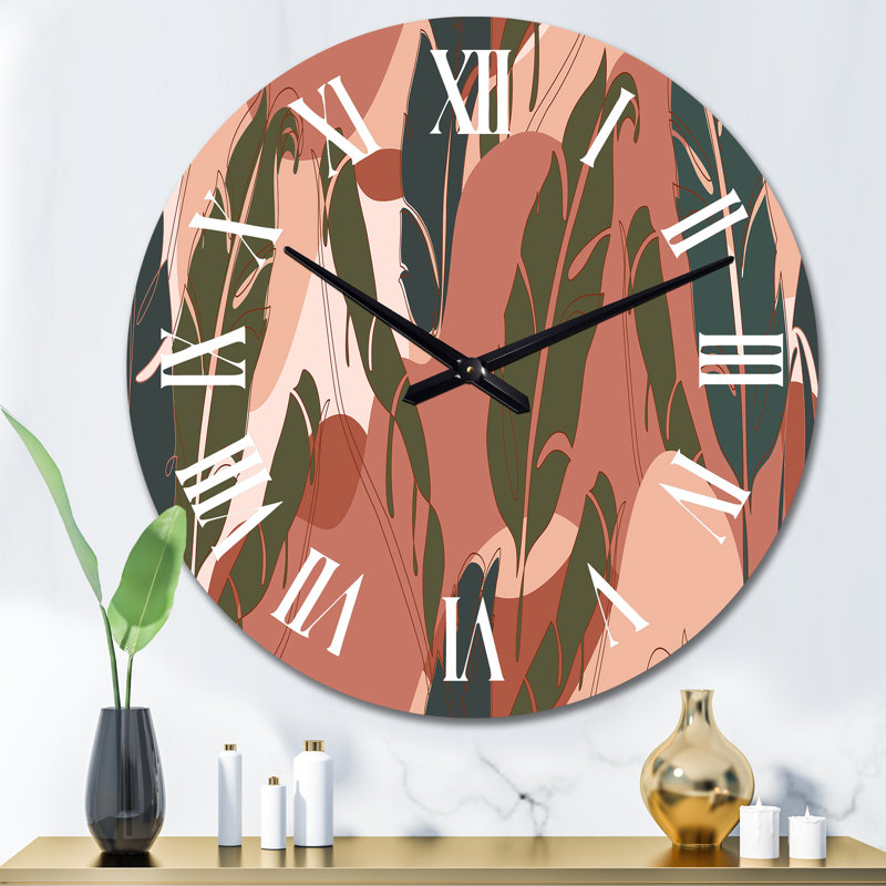 Horloge murale traditionnelle feuilles de bananier sur tons terre cuite, Médium
