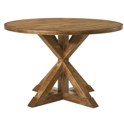 Table de salle à manger ronde en chêne patiné Henninger