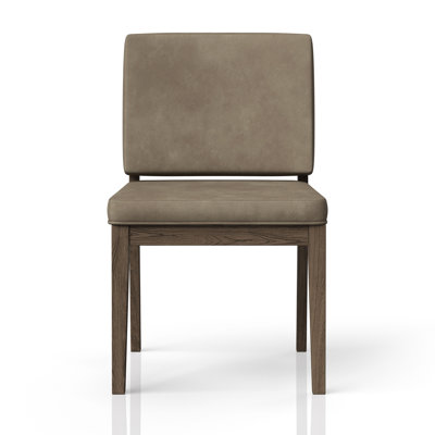 Ensemble de deux fauteuils à dossier souple en cuir