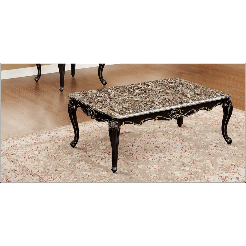 Table basse de style transitionnel avec plateau en marbre, pieds en cabriole et détails dorés pour plus d'élégance et de fonctionnalité
