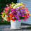 Fleurs artificielles d'extérieur résistantes aux rayons UV - arrangements floraux réalistes pour le jardin, le patio, le porche - résistant à la décoloration toutes saisons et nécessitant peu d'entretien (paquet de 12, styles variés)
