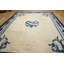 Tapis noué antique à médaillon chinois