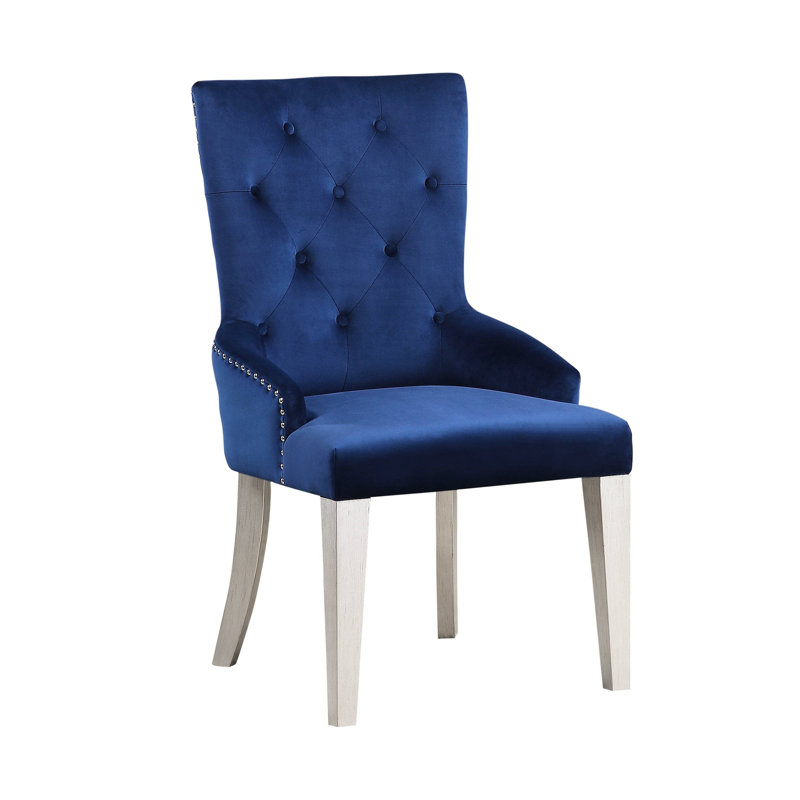 Chaise rembourrée bleue avec accoudoirs à dossier bas et anneau de traction rembourré