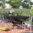 Harland Rectangular Metal Extendable Outdoor Dining Table With Umbrella Hole , 108'' in. W 48'' in. D