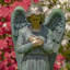 Evangeline Holding Heart Magensium Angel Garden Statue