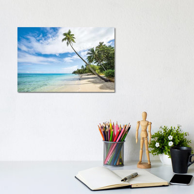 Palm Tree At The Beach On A Tropical Island In The South Sea by Jan Becke - Wrapped Canvas Gallery-Wrapped Canvas Giclée