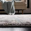 Izzo Abstract Area Rug-1855802372