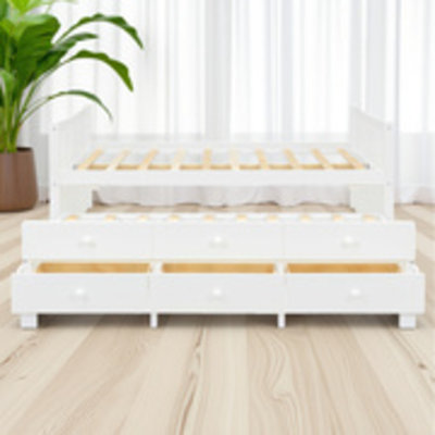 Lit double blanc avec tiroirs Canapé-lit Conception à positions de couchage multiples Tiroirs de rangement intégrés Fabrication robuste et peu encombrante Idéal pour les chambres d'amis et les espaces compacts