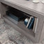 Table basse moderne aspect béton, ton brun, avec tiroir et rangement ouvert