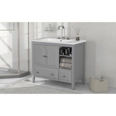 Ensemble de meuble-lavabo gris avec lavabo en céramique, armoire de rangement à cadre solide avec deux portes, tiroirs et poignées en métal