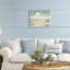 Plaque murale avec vue sur l'eau et nuages, design par Christy McKee