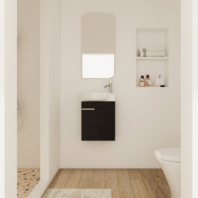 Meuble-lavabo compact à fermeture en douceur avec lavabo en céramique, parfait pour les petites salles de bain et un rangement efficace