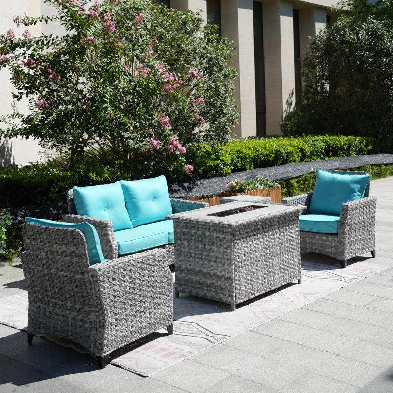 Woodrum Wicker 4 - Person Patio Conversation Set with Cushions, Cyan