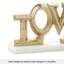 Sculpture dorée en aluminium et symbole de l'amour sur base de marbre