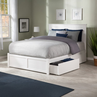 Kindig Solid Wood Platform Bed with Panel Footboard and Storage Drawers