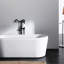 Robinet de baignoire autoportant en métal noir mat avec pomme de douche amovible, finition
