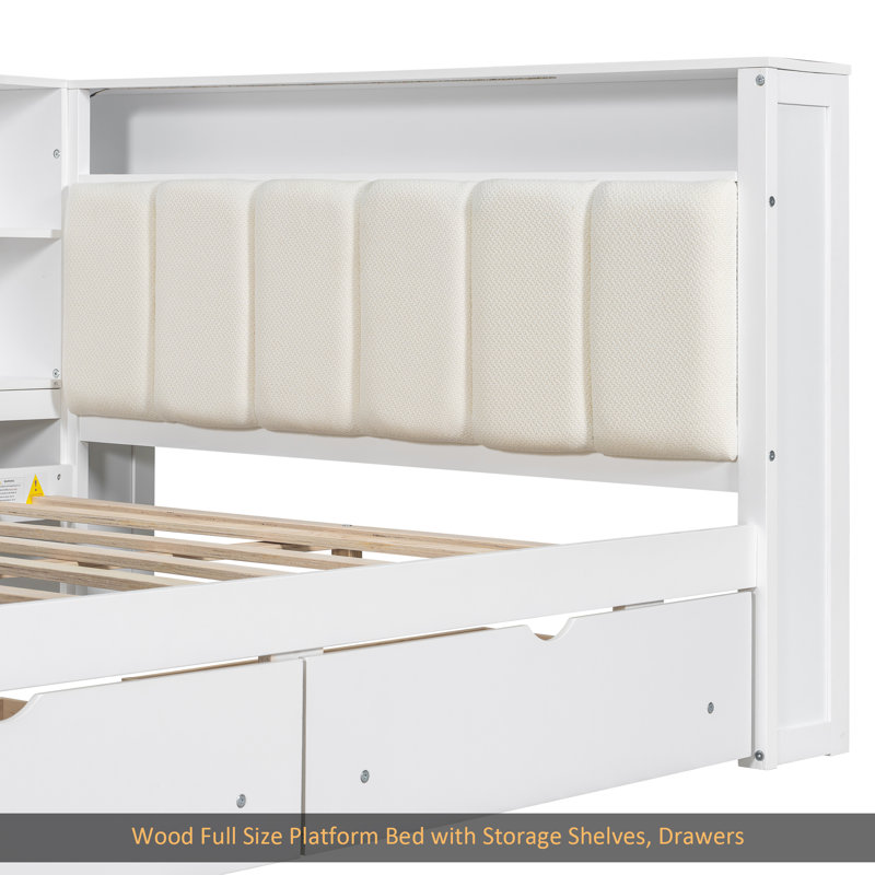 Lit plateforme en bois pleine grandeur avec tablettes de rangement, tiroirs, station de charge, DEL, bureau et tête de lit tapissier, coussin blanc et beige