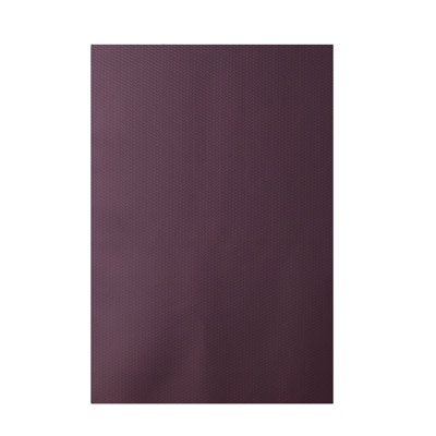 Tapis mauve à tissage plat
