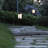 Set of 2 Brown and White Solar-Powered Hanging Lanterns with Shepherd Hooks