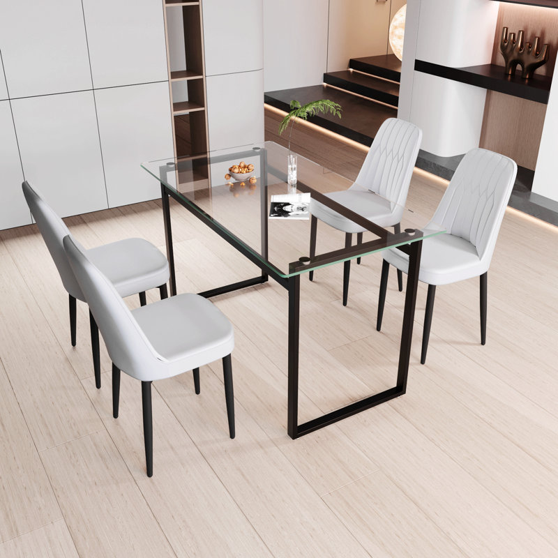 Ensemble de table de salle à manger 51 "pour 4 personnes en verre, ensemble de cuisine avec table et chaises à pieds en métal noir, plateau de table rectangulaire moderne en verre trempé et chaise de salle à manger rembourrée en polyuréthane épais