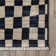 Dominique Abstract Checkered Fringe Area Rug