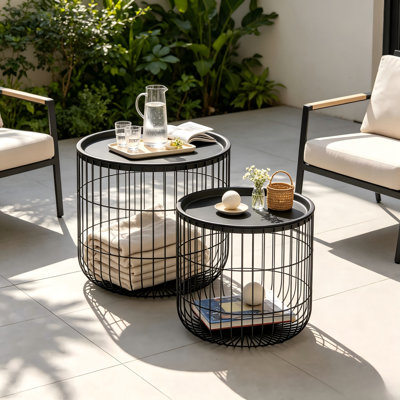 Modern round nesting coffee table set with metal frames and removable tops; can be used as side tables or a coffee table.
