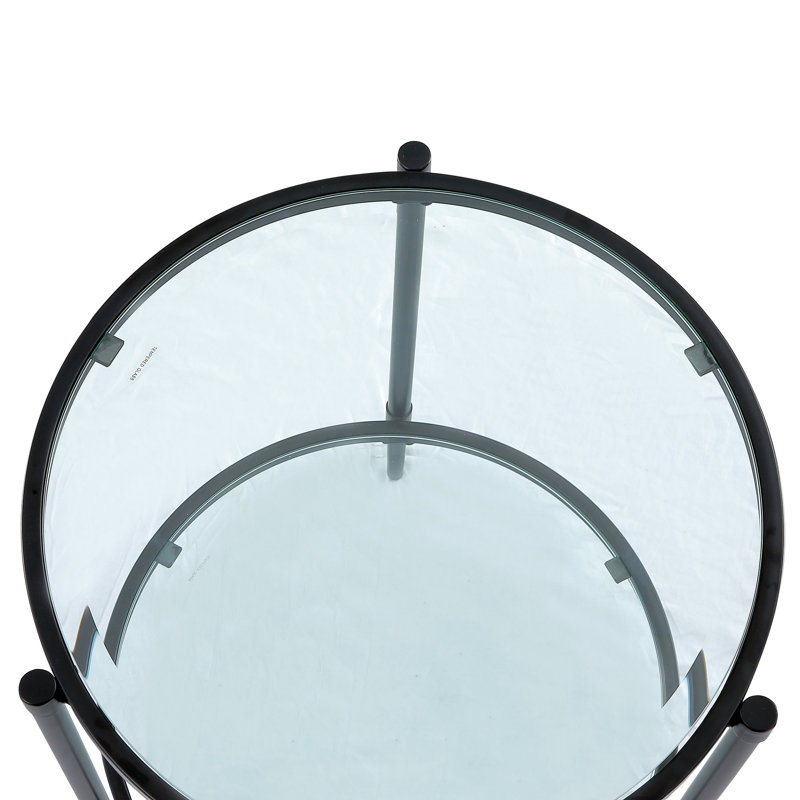 Table basse élégante et minimaliste, verre trempé transparent et cadre industriel noir mat