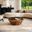 Table basse moderne en forme de nuage avec plateau en verre et base ondulée pour le décor du salon