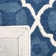 Carolene Hand Tufted Wool/Cotton/Latex Geometric Rug in Blue/Ivory
