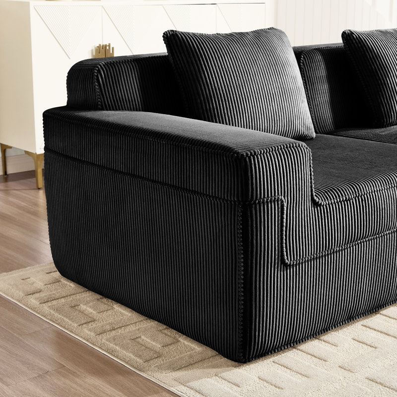 Canapé d'angle modulaire 2 places avec assise profonde, modèle Cloud sans os, en velours côtelé noir, livré monté, confortable et idéal pour les moments en famille, avec coussins amovibles, tissu respirant et base antidérapante.