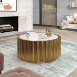 Table basse en marbre avec base en acier inoxydable doré