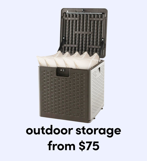 A brown wicker-texture deck box for outdoor storage with the lid open, filled with white cushions, from $75.