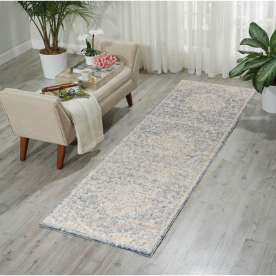 Tapis bleu marine à motif médaillon de la collection Allart