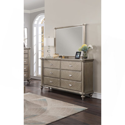 Commode de luxe avec finition argentée et champagne