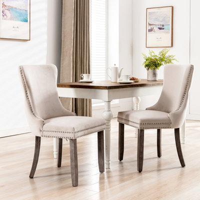 Chaise rembourrée beige (2 pièces). Fabrication en bois massif. Haut dossier. Coussin en mousse confortable. Repose-pieds réglables. Sw8809bg 2 chaises. Cadre. Pour plus de confort
